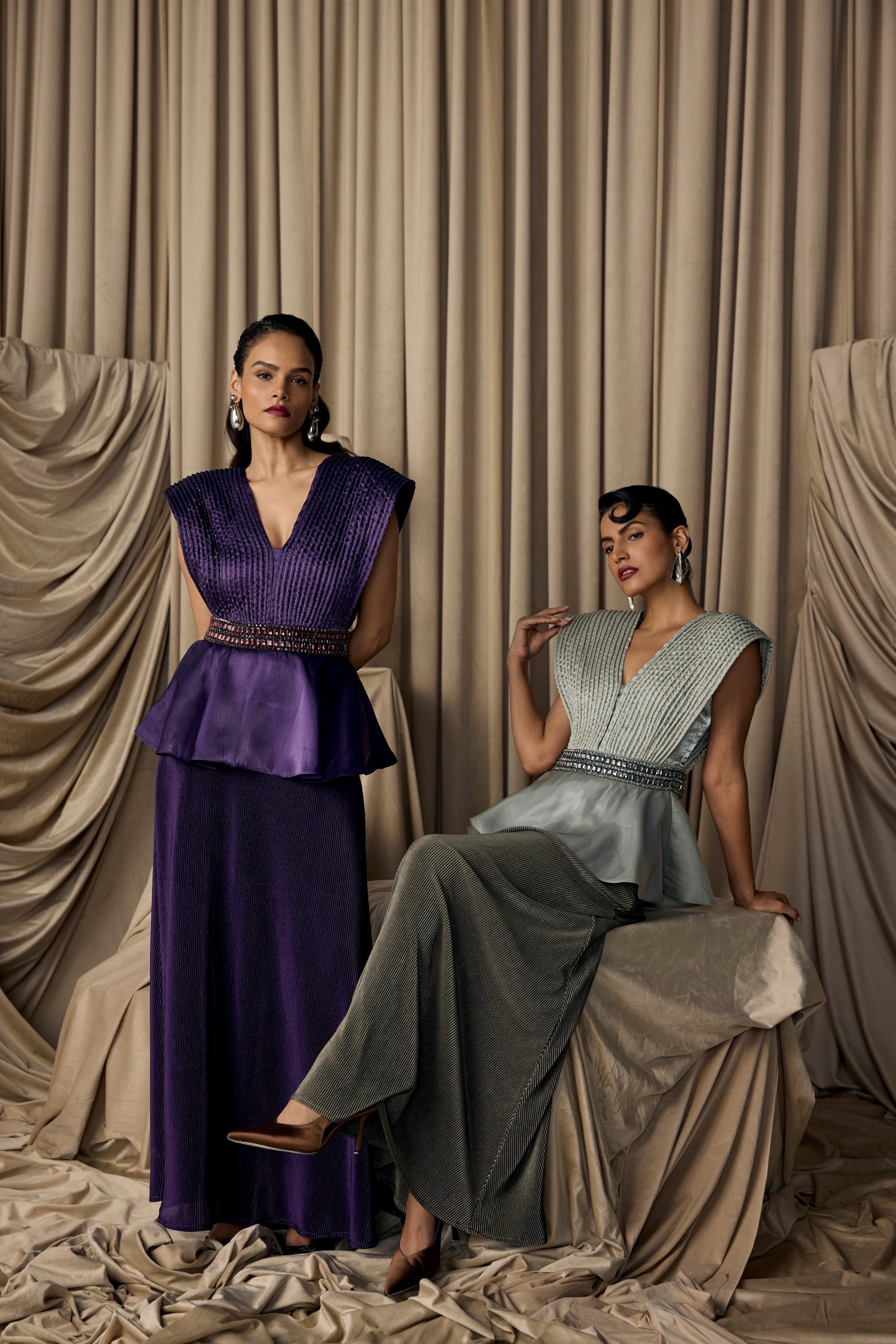 purple dori peplum top with pleated skirt