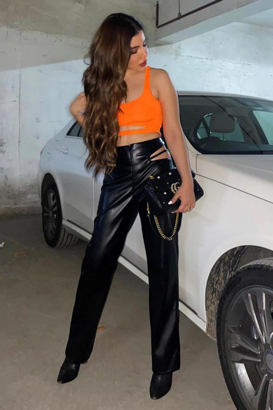 Cut out leather pants with neon strap top