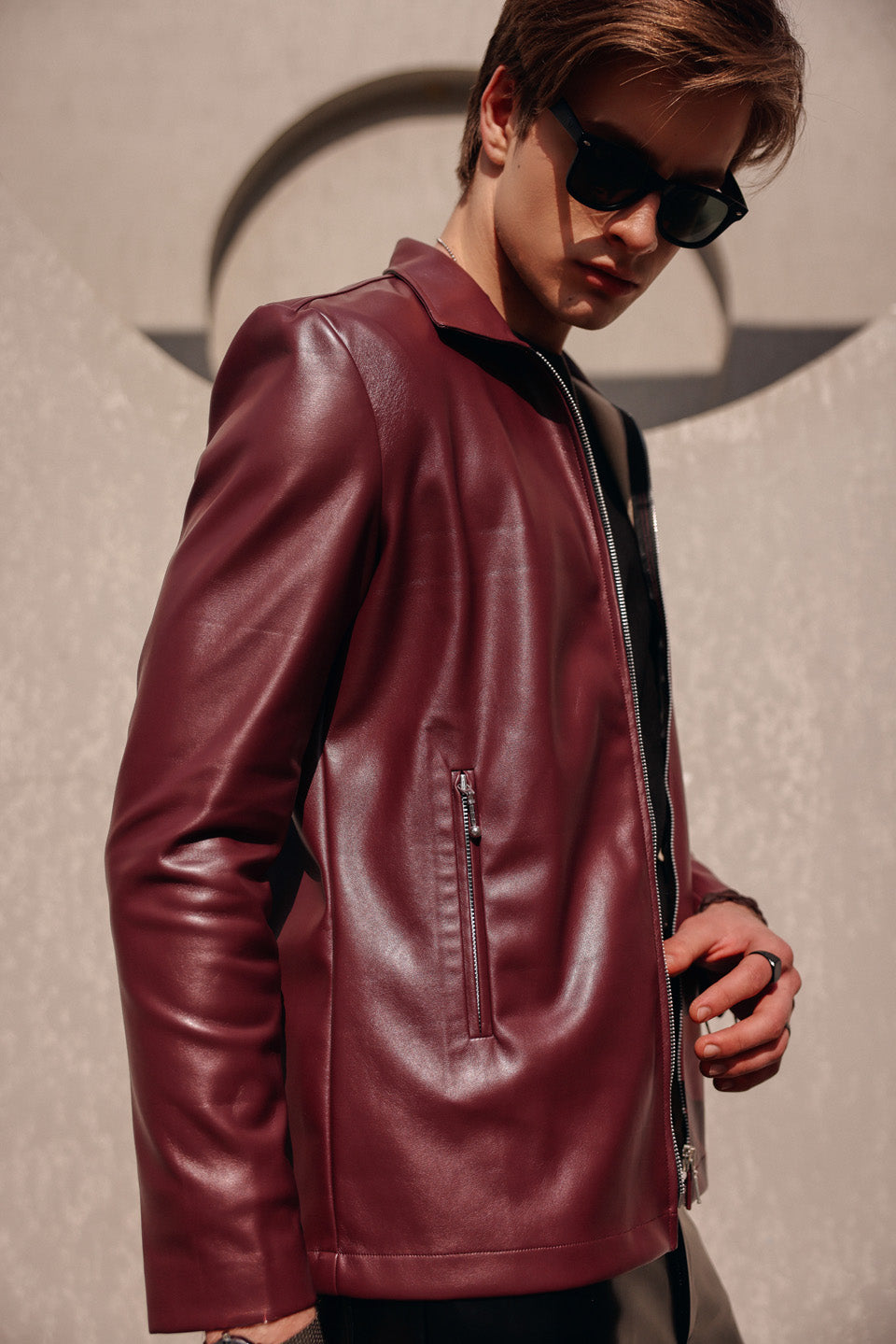 Maroon leather zipper jacket with leather pants