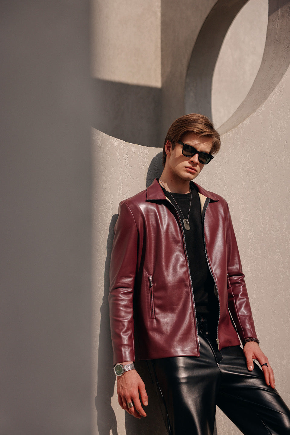 Maroon leather zipper jacket with leather pants