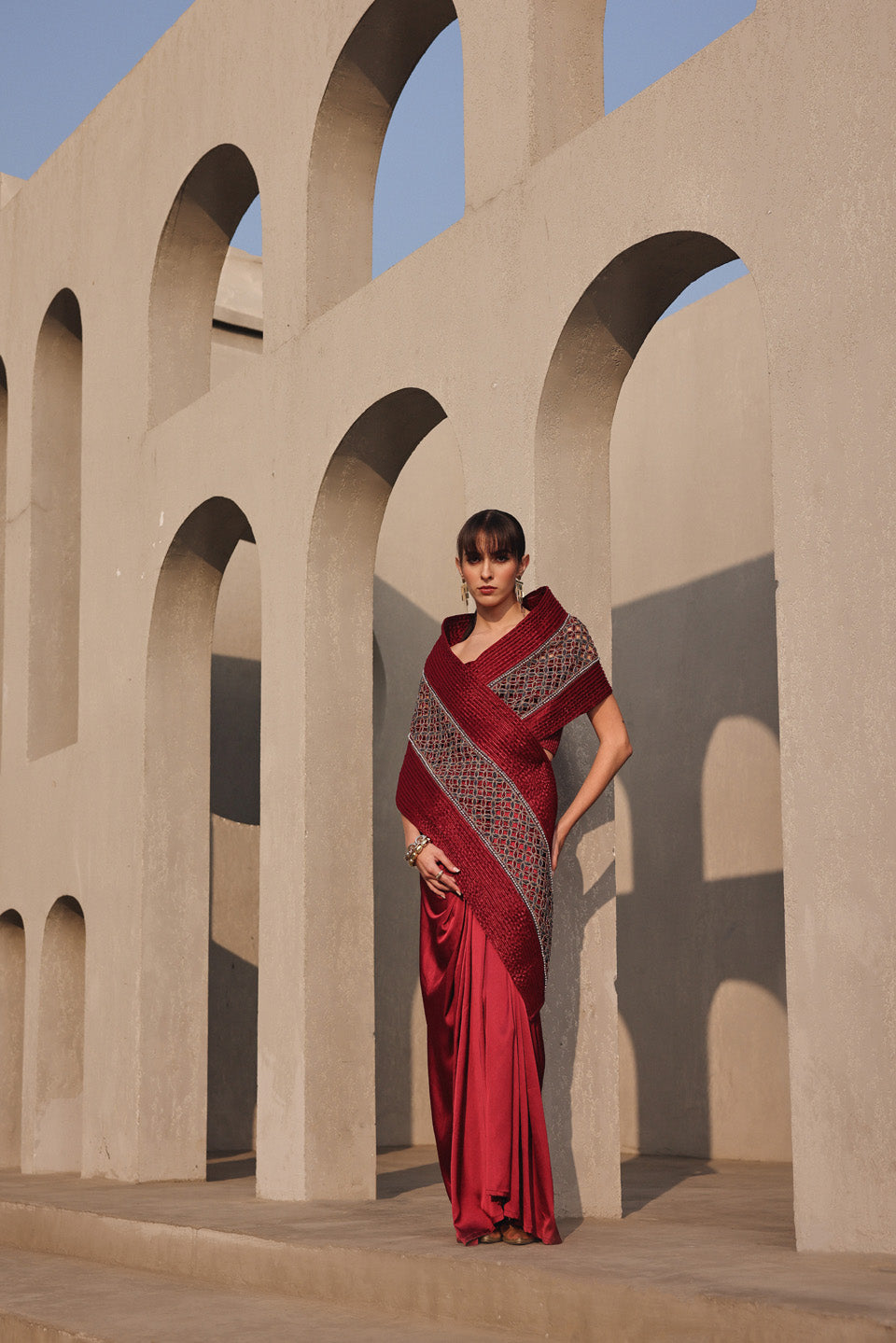 Ethereal maroon red dori embroidered pallu drape saree