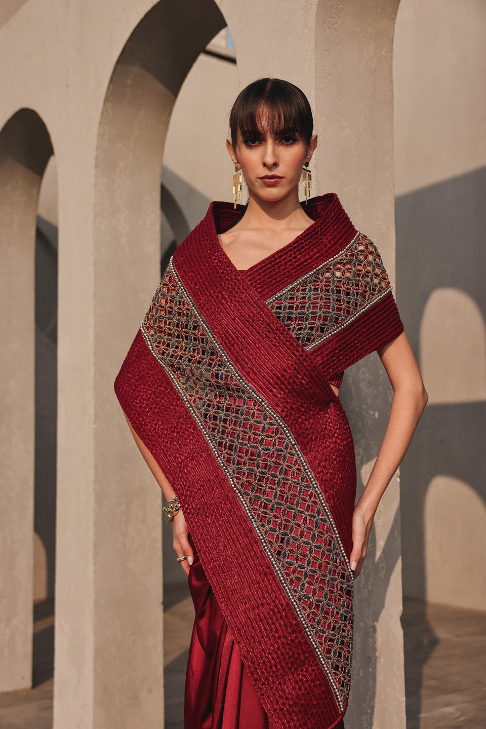 Ethereal maroon red dori embroidered pallu drape saree