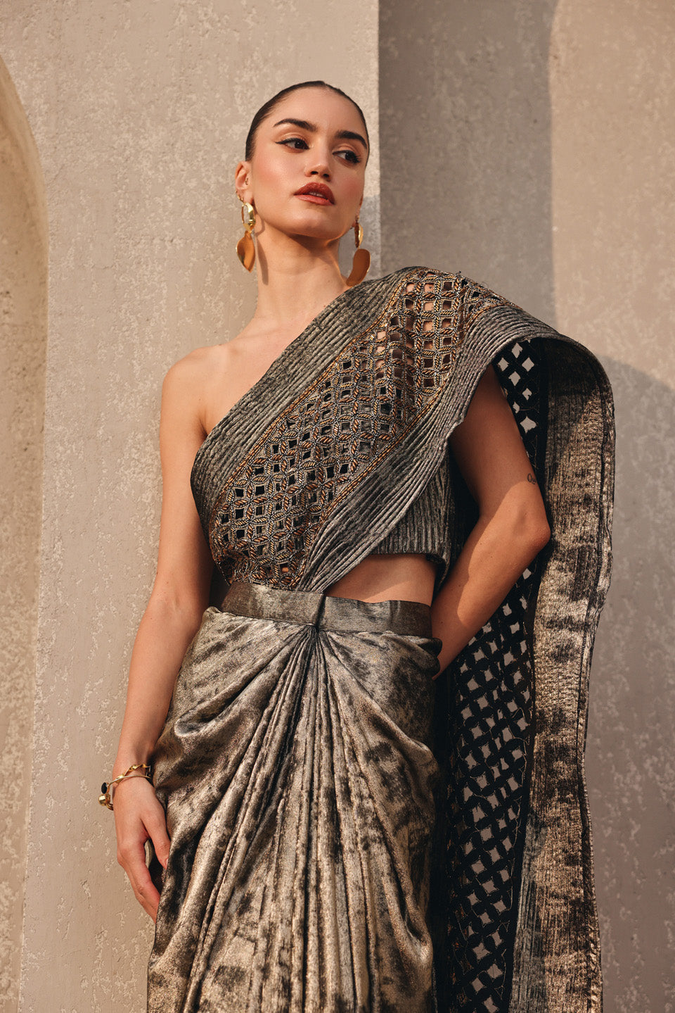 Ethereal metallic dark gold dori embroidered pallu drape saree