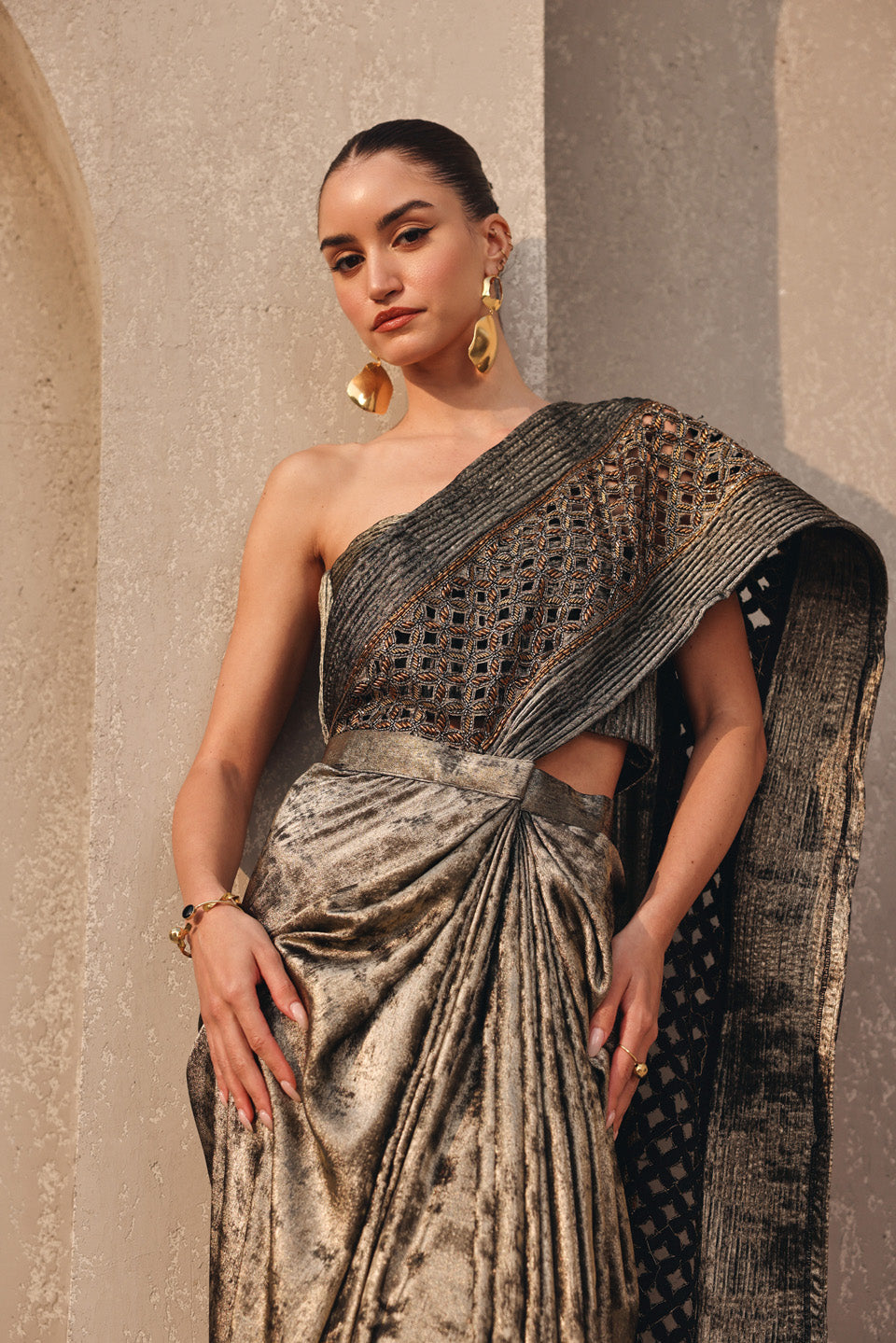 Ethereal metallic dark gold dori embroidered pallu drape saree