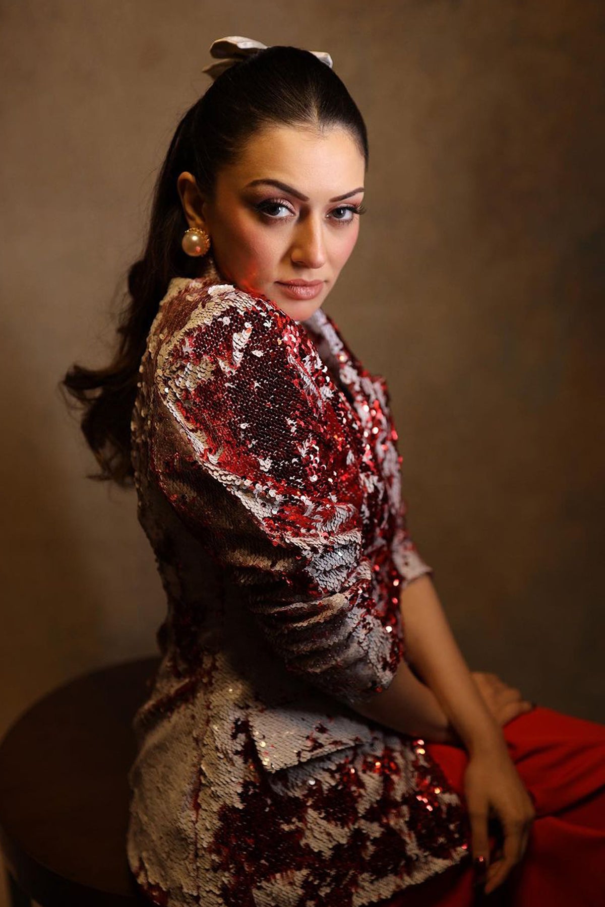 Hansika Motwani in Shaded Merry Red White Sequence Blazer With Flaired Red Skirt