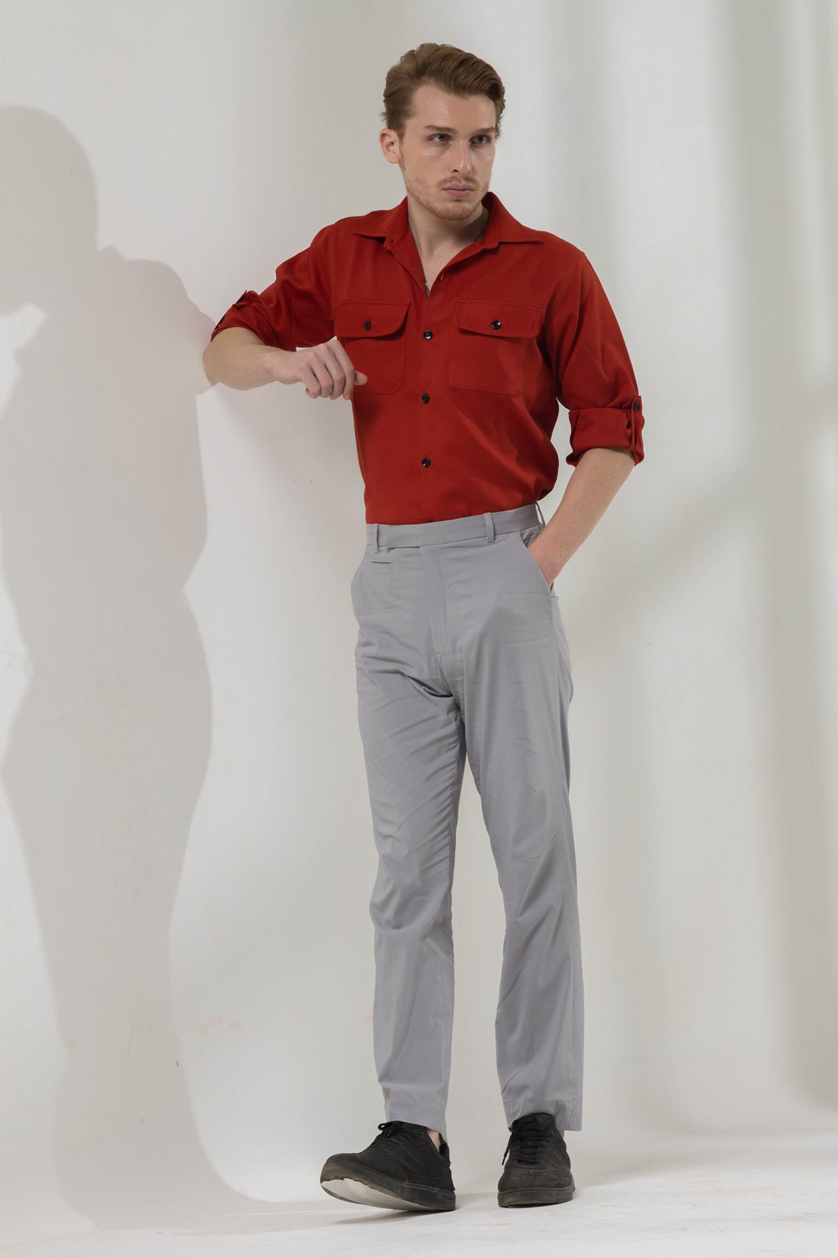 Rust orange shirt with classic grey trousers