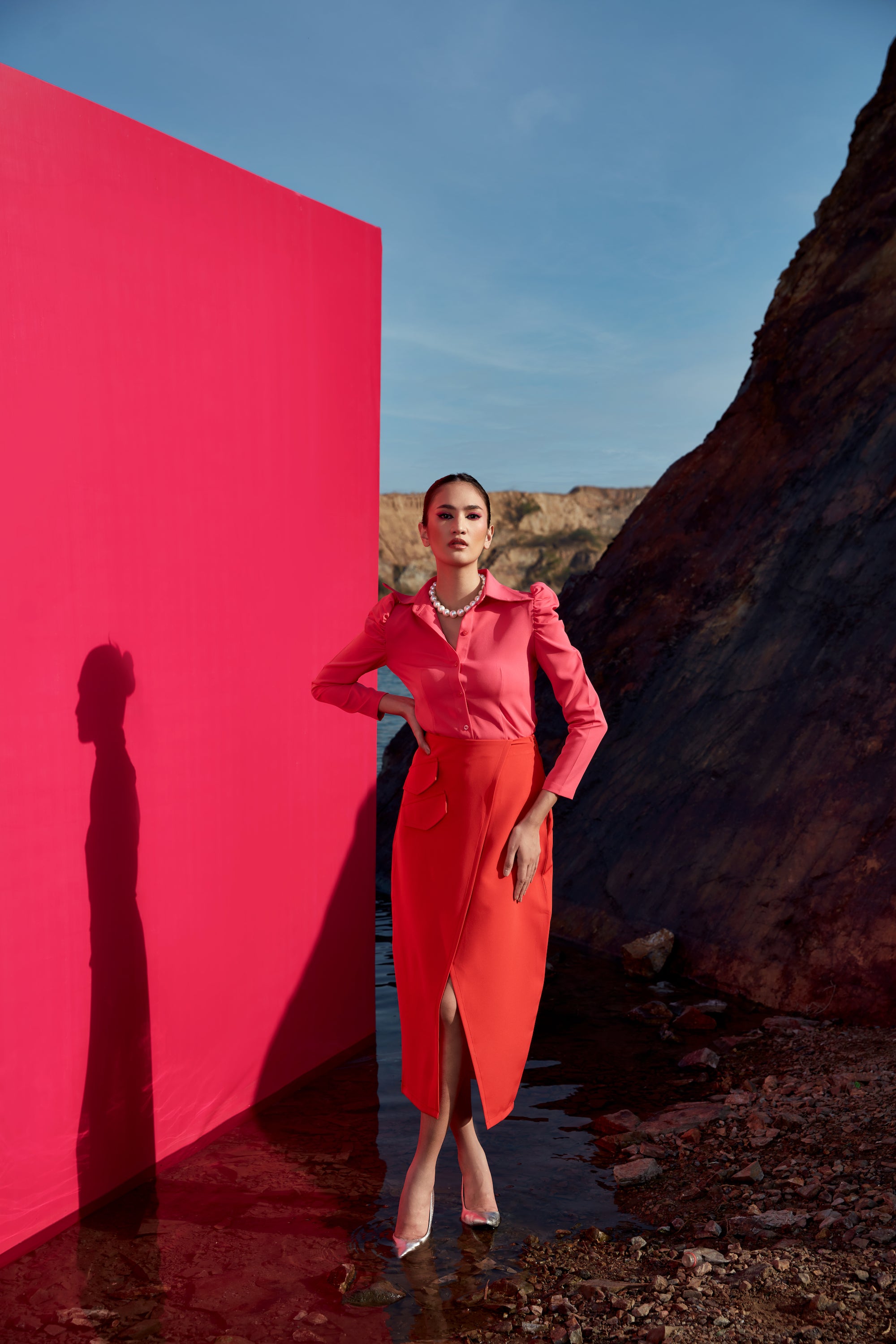 Cailo gigot pink shirt with red skirt