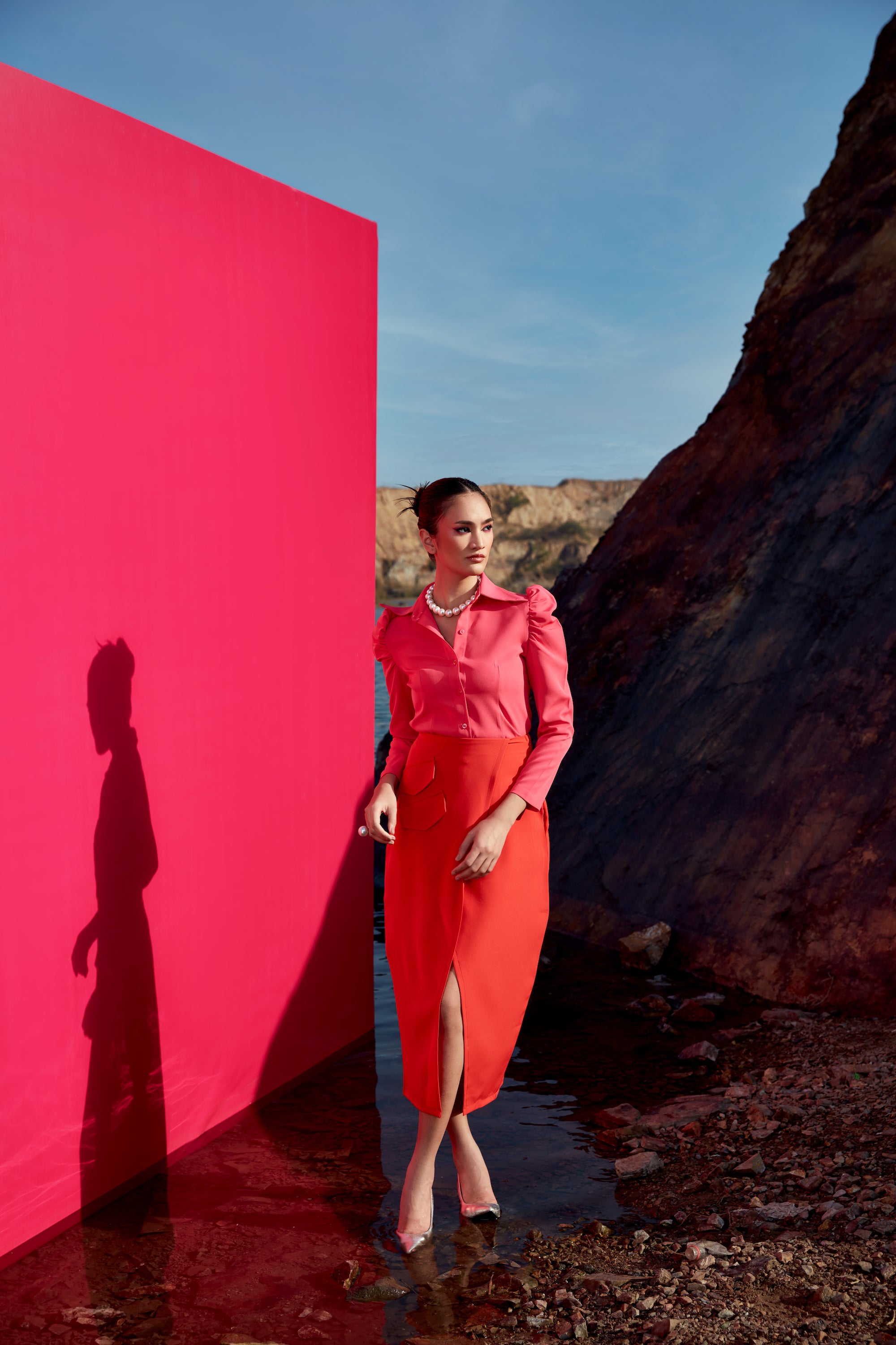 Cailo gigot pink shirt with red skirt